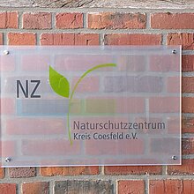 Eingangsschild am Naturschutzzentrum